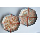 A pair of octagonal 19th Century Imari wall plates with brightly coloured decoration. Approx. 28 cms