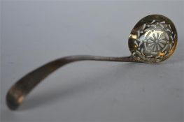 A Georgian bead edge sifter spoon with pierced bowl. By TN. Est. £20 - £30.