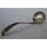 A Georgian bead edge sifter spoon with pierced bowl. By TN. Est. £20 - £30.