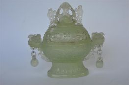 A Chinese jadeite Koro and cover on pedestal base. Approx 15 cms high. Est. £50 - £60.
