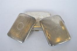 A group of curved engine turned cigarette boxes. Approx 230 grams. Est. £50 - £60.