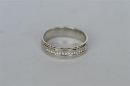 A good diamond modern eternity ring. Est. £300 - £350.