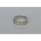 A good diamond modern eternity ring. Est. £300 - £350.