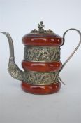 A Chinese hard stone set teapot with gilt lift off cover, decorated with dragons. Est. £60 - £70.