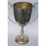 A large impressive two handled trophy cup. London 1905. Approx 995 grams. Est. £200 - £250.