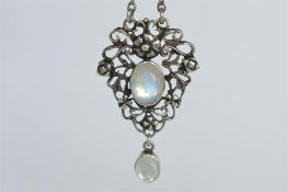 A silver and moonstone Arts & Crafts pendant on fine link chain. Est. £170 - £180.