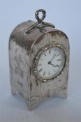 A good quality Victorian mantle clock with Oriental decoration on bracket feet with white enamel