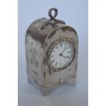 A good quality Victorian mantle clock with Oriental decoration on bracket feet with white enamel