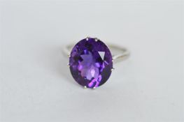 A good platinum ring mount set with large oval amethyst. Est. £250 - £300.