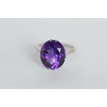 A good platinum ring mount set with large oval amethyst. Est. £250 - £300.