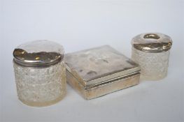 A silver hinged top cigarette box together with hobnail cut jars. Est. £10 - £15.