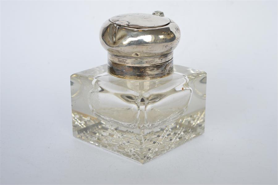 A heavy rectangular hinged inkwell of square form. Est. £30 - £40.