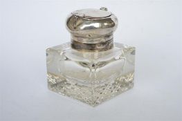 A heavy rectangular hinged inkwell of square form. Est. £30 - £40.