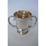 A good heavy stylish silver two handled trophy cup. London 1903. By Elkington & Co. Approx. 760