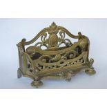 A heavy brass French ormolu mounted letter rack. Est. £15 - £20.