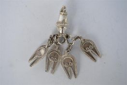 An unusual Eastern pendant with wire work decoration. Approx 33 grams. Est. £20 - £30.