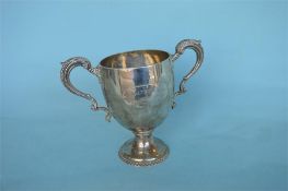 A heavy Georgian style two handled trophy cup. London 1896. Approx. 690 grams. Est. £180 - £220.