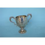 A heavy Georgian style two handled trophy cup. London 1896. Approx. 690 grams. Est. £180 - £220.