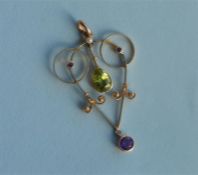 An Art Deco style peridot, pearl and amethyst drop pendant with loop top. Est. £120 - £150.