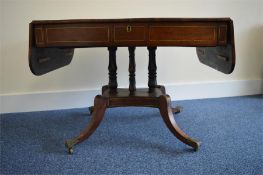 A good Regency single pedestal sofa table with brass string inlay and single drawer. Est. £300 - £