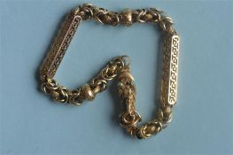An Antique gold necklace with long and short links and snake clasp. Est. £500 - £600.