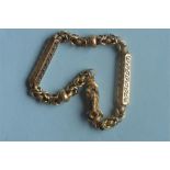 An Antique gold necklace with long and short links and snake clasp. Est. £500 - £600.