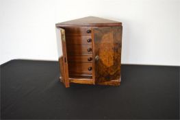 A good burr walnut five drawer jewellery chest on pedestal foot with brass lock. Est. £200 - £250.