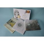 A 1996 uncirculated coin collection set together with a Prince George of Cambridge ¼ oz silver