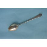 An OE basting spoon with initialled terminal. By HB. Approx. 100 grams. Est. £40 - £50.