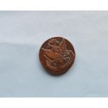 A Russian copper commemorative coin.