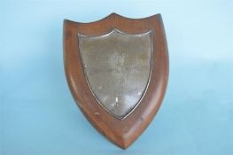 An oak mounted shield shaped plaque. Birmingham. By H&W. Est. £50 - £60.