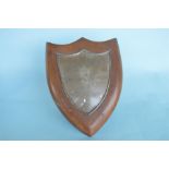 An oak mounted shield shaped plaque. Birmingham. By H&W. Est. £50 - £60.