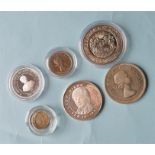 A Queen Elizabeth $1, together with a Scottish 25 ECU coin etc.