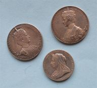 A group of three silver Coronation coins.