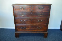 A good Georgian mahogany flat front chest of five drawers on bracket feet. Est. £150 - £200.