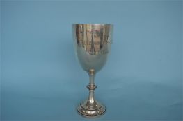 A large heavy goblet with tapered supports. Birmingham 1908. By WN. Approx. 400 grams. Est. £