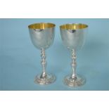 A pair of heavy commemorative goblets with gilt interiors. London modern. By Garrards. Approx. 386