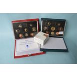 A 1990 UK proof coin collection together with a 1995 set, together with a Farewell Adieu.