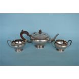 A circular Art Deco style baluster three piece tea service. Birmingham 1920. Approx 900 grams.