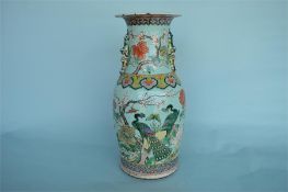 A good blue ground 19th Century Chinese Canton baluster shaped vase decorated with birds. Approx. 46