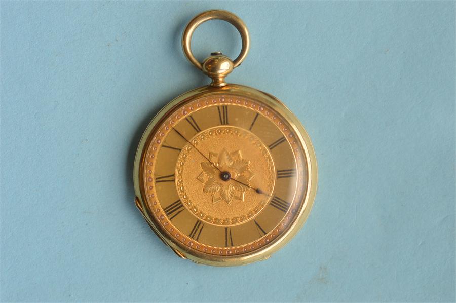 A Continental 18ct gold slim fob watch with gilt dial and enamel back. Est. £80 - £100.