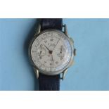 A gent's chronograph wristwatch on leather strap. Est. £100 - £120.