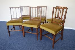 A set of six mahogany Antique chairs with tapered supports and upholstered seats. Est. £200 - £250.