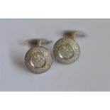 A good pair of diamond cufflinks in white gold. Est. £400 - £500.