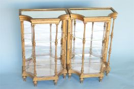 A good pair of Continental gilt mirrored shelves with dental frieze. Est. £300 - £400.