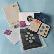 Various cased uncirculated coin collections.