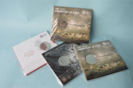 Four Royal Mint £5 coin sets.