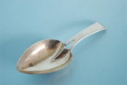 A Georgian caddy spoon with heart shaped bowl. Birmingham 1802. Est. £30 - £40.