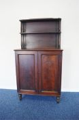 An Antique mahogany chiffonier with shelf back. Est. £150 - £200.