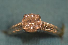 A diamond single stone ring in platinum claw setting. Est. £1300 - £1500.